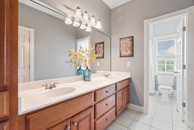 842 Shun Pike, Cottontown, TN 37048 - full bathroom featuring tile patterned flooring, double vanity, toilet, and baseboards