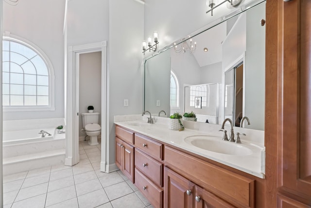842 Shun Pike, Cottontown, TN 37048 - bathroom with a bath, double vanity, tile patterned flooring, and toilet