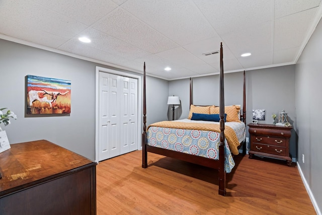 842 Shun Pike, Cottontown, TN 37048 - bedroom featuring light wood-type flooring, a closet, recessed lighting, and baseboards