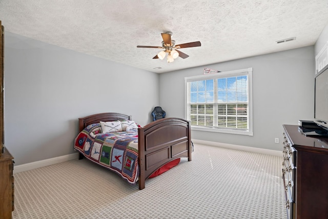 842 Shun Pike, Cottontown, TN 37048 - bedroom featuring baseboards, carpet floors, a textured ceiling, and ceiling fan