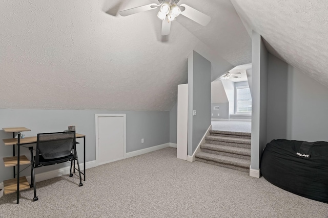 842 Shun Pike, Cottontown, TN 37048 - additional living space with ceiling fan, a textured ceiling, light colored carpet, lofted ceiling, and baseboards