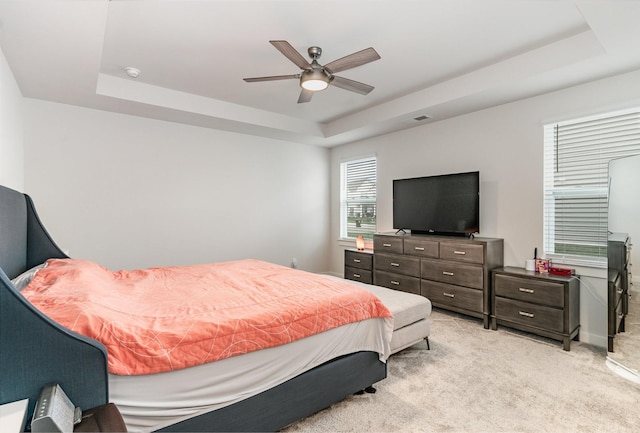 120 Ravens Crest Ave, Mount Juliet, TN 37122 - bedroom with a tray ceiling, light colored carpet, and ceiling fan