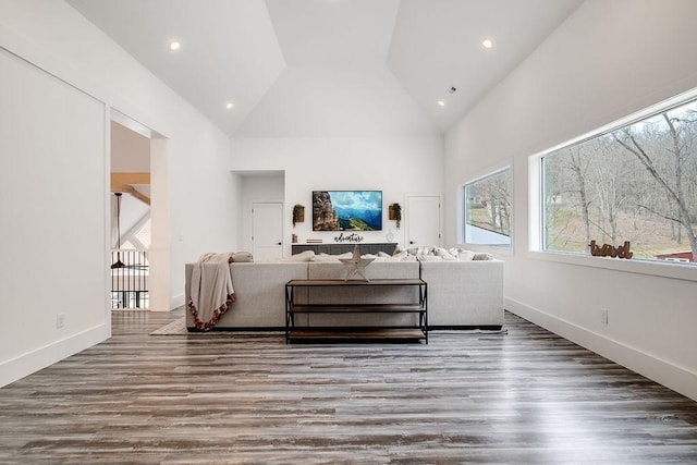 407 Hogans Branch Rd, Goodlettsville, TN 37072 - living room with healthy amount of natural light, wood finished floors, high vaulted ceiling, recessed lighting, and baseboards