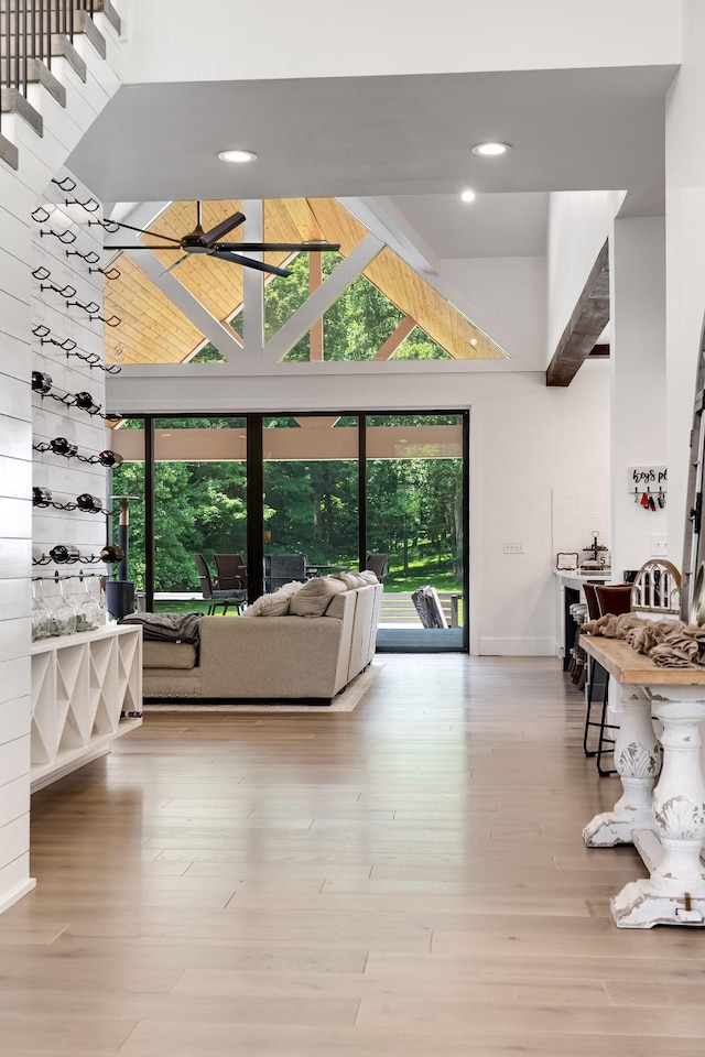 407 Hogans Branch Rd, Goodlettsville, TN 37072 - living room with a ceiling fan, baseboards, high vaulted ceiling, wood finished floors, and recessed lighting