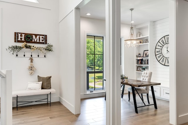 407 Hogans Branch Rd, Goodlettsville, TN 37072 - doorway to outside with light wood-style floors, a chandelier, built in shelves, recessed lighting, and baseboards