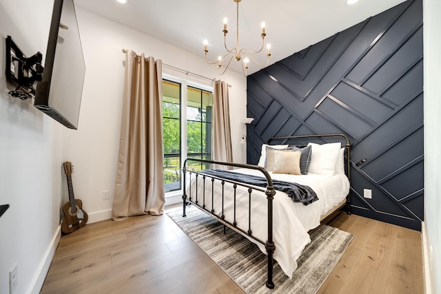 407 Hogans Branch Rd, Goodlettsville, TN 37072 - bedroom with light wood-type flooring, a chandelier, baseboards, and recessed lighting