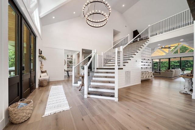 407 Hogans Branch Rd, Goodlettsville, TN 37072 - entrance foyer with high vaulted ceiling, stairs, wood finished floors, recessed lighting, and a chandelier