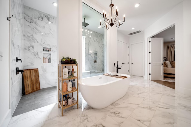 407 Hogans Branch Rd, Goodlettsville, TN 37072 - ensuite bathroom featuring a soaking tub, tile walls, a chandelier, marble tiled flooring, and recessed lighting