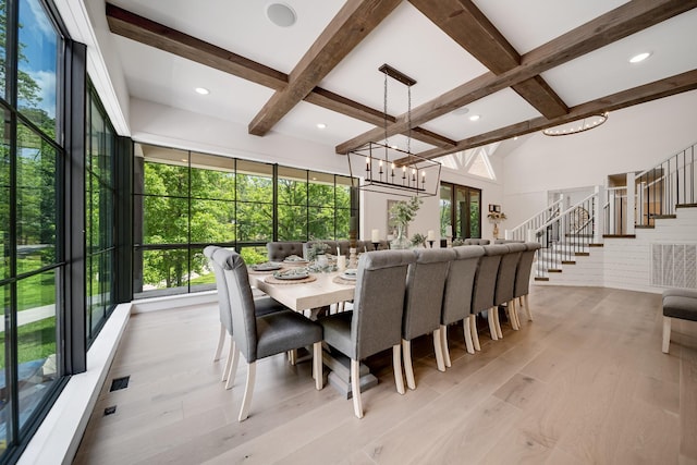 407 Hogans Branch Rd, Goodlettsville, TN 37072 - dining room with beamed ceiling, a chandelier, light wood finished floors, coffered ceiling, and stairs