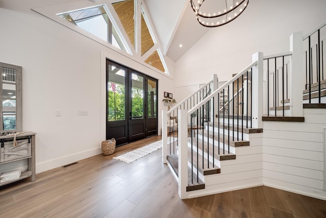 407 Hogans Branch Rd, Goodlettsville, TN 37072 - entrance foyer featuring a chandelier, high vaulted ceiling, healthy amount of natural light, stairway, and baseboards