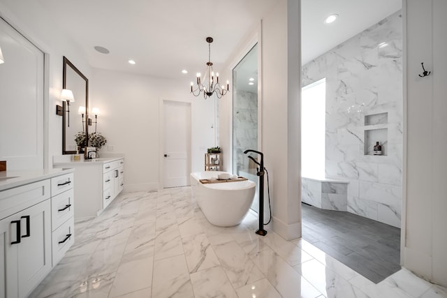 407 Hogans Branch Rd, Goodlettsville, TN 37072 - full bathroom with vanity, a freestanding bath, a chandelier, recessed lighting, and marble look tiles