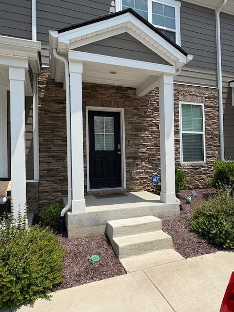 1217 Mason Dl, Columbia, TN 38401 - property entrance with stone siding and covered porch
