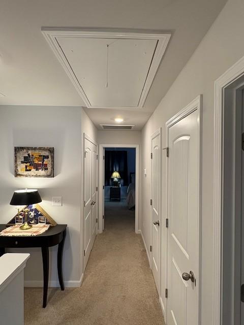 1217 Mason Dl, Columbia, TN 38401 - hallway with attic access, light colored carpet, and baseboards