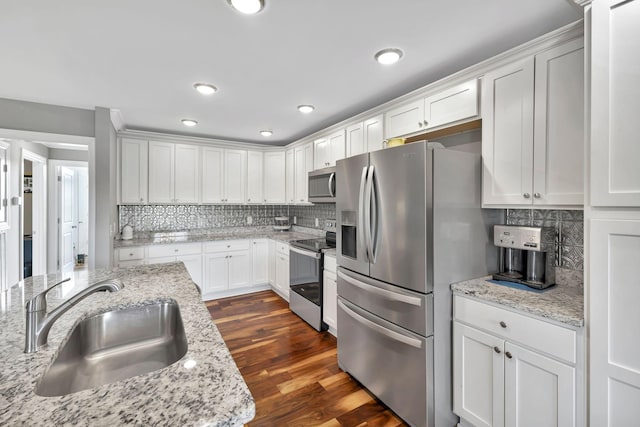 4717 Lunns Store Rd, Chapel Hill, TN 37034 - kitchen featuring appliances with stainless steel finishes, a sink, tasteful backsplash, white cabinets, and recessed lighting