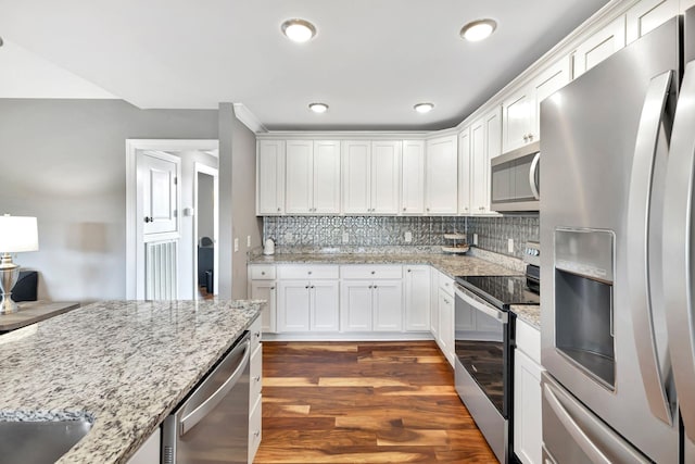 4717 Lunns Store Rd, Chapel Hill, TN 37034 - kitchen featuring appliances with stainless steel finishes, dark wood-style floors, tasteful backsplash, white cabinets, and recessed lighting