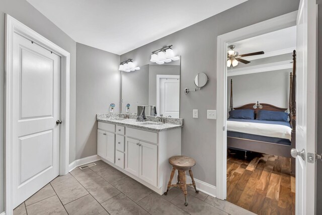 4717 Lunns Store Rd, Chapel Hill, TN 37034 - bathroom with ensuite bathroom, double vanity, baseboards, and a ceiling fan