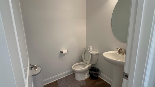 213 Rosemary Way, Mount Juliet, TN 37122 - half bathroom with toilet, baseboards, wood finished floors, and a sink