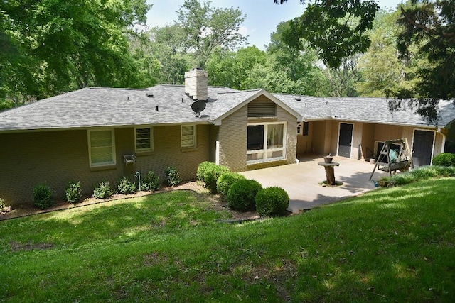 1314 Burton Valley Rd, Nashville, TN 37215 - rear view of house with a patio area, a lawn, a chimney, brick siding, and roof with shingles