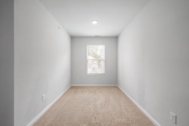 148 Victory Cir, Ashland City, TN 37015 - spare room featuring light colored carpet and baseboards