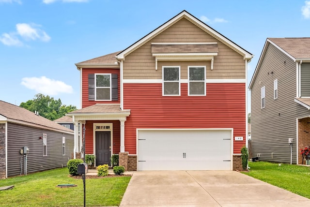 148 Victory Cir, Ashland City, TN 37015 - view of front facade featuring a front yard, concrete driveway, and a garage