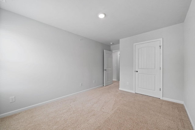 148 Victory Cir, Ashland City, TN 37015 - unfurnished bedroom with baseboards and light carpet