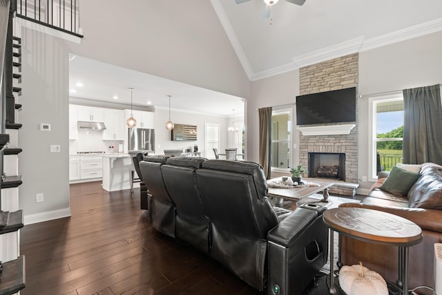 290 Academy Rd, Lebanon, TN 37087 - living area featuring a ceiling fan, high vaulted ceiling, dark wood-style floors, crown molding, and a fireplace