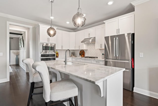 290 Academy Rd, Lebanon, TN 37087 - kitchen featuring appliances with stainless steel finishes, a sink, under cabinet range hood, baseboards, and decorative backsplash