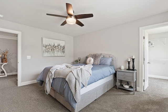 290 Academy Rd, Lebanon, TN 37087 - carpeted bedroom featuring a spacious closet, ceiling fan, baseboards, and a closet