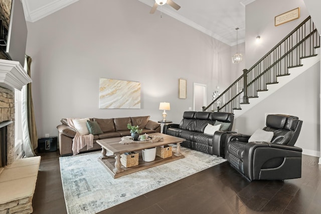 290 Academy Rd, Lebanon, TN 37087 - living room with a towering ceiling, ornamental molding, stairway, ceiling fan, and a stone fireplace