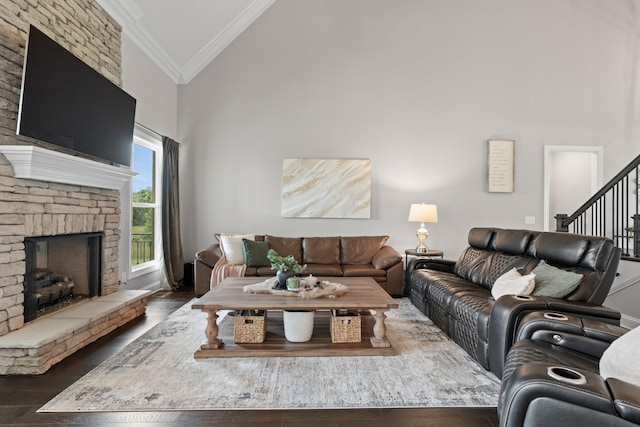 290 Academy Rd, Lebanon, TN 37087 - living area featuring crown molding, high vaulted ceiling, wood finished floors, a large fireplace, and stairs