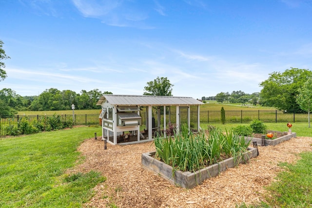 290 Academy Rd, Lebanon, TN 37087 - view of yard featuring exterior structure, a vegetable garden, and an outdoor structure