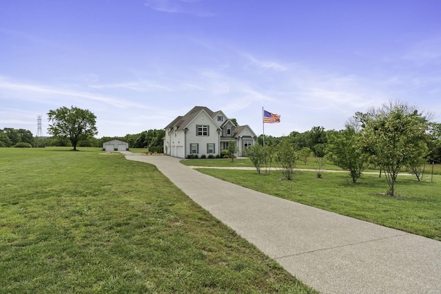 290 Academy Rd, Lebanon, TN 37087 - view of front of house with a front lawn, a garage, an outbuilding, and driveway