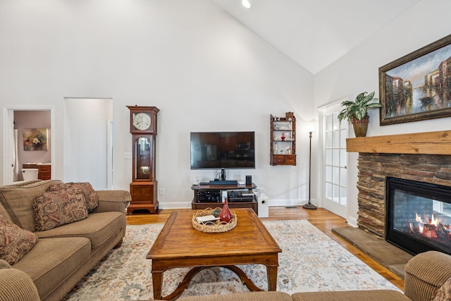 2090 Lequire Ln, Spring Hill, TN 37174 - living room with high vaulted ceiling, a fireplace, wood finished floors, and baseboards