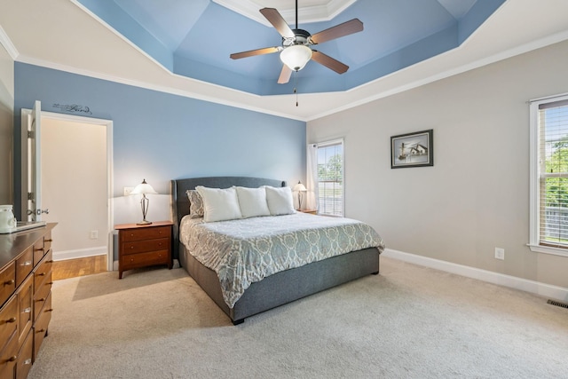 2090 Lequire Ln, Spring Hill, TN 37174 - bedroom featuring a raised ceiling, light carpet, crown molding, multiple windows, and baseboards