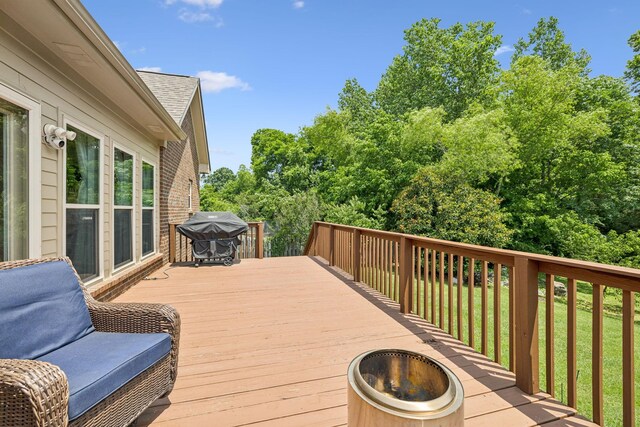2090 Lequire Ln, Spring Hill, TN 37174 - wooden terrace with grilling area, an outdoor fire pit, and a yard