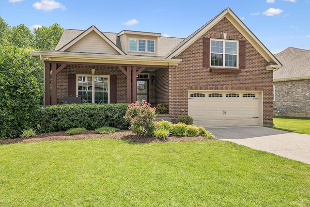 2090 Lequire Ln, Spring Hill, TN 37174 - view of front facade with brick siding, driveway, a front lawn, a garage, and a shingled roof