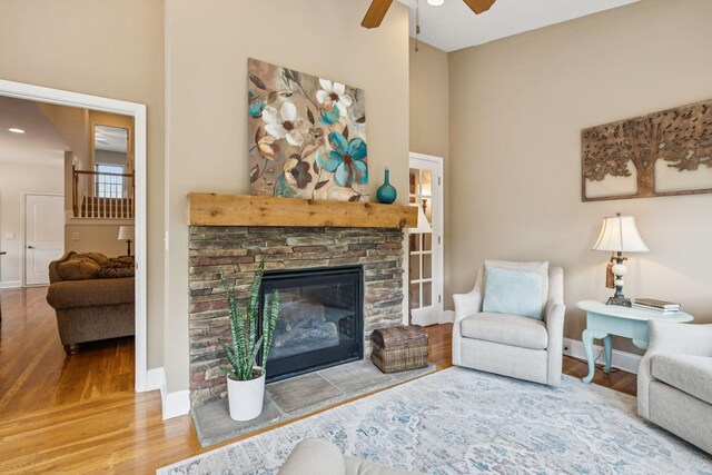 2090 Lequire Ln, Spring Hill, TN 37174 - living area featuring ceiling fan, wood finished floors, baseboards, a stone fireplace, and recessed lighting