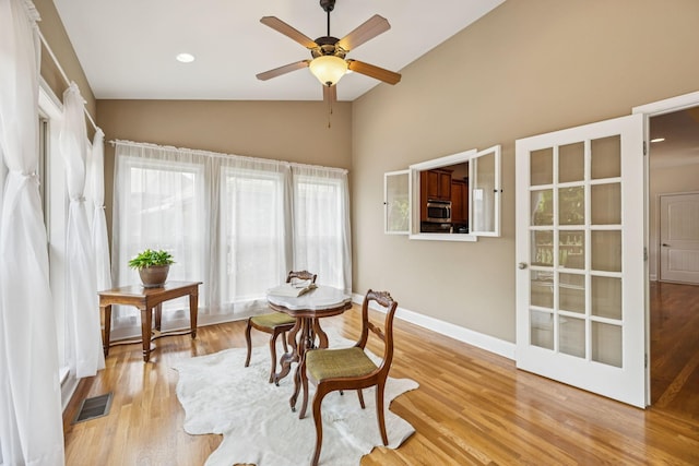 2090 Lequire Ln, Spring Hill, TN 37174 - dining room with ceiling fan, light wood finished floors, baseboards, and high vaulted ceiling