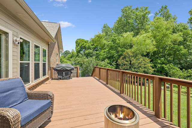 2090 Lequire Ln, Spring Hill, TN 37174 - wooden terrace with an outdoor fire pit, area for grilling, and a yard