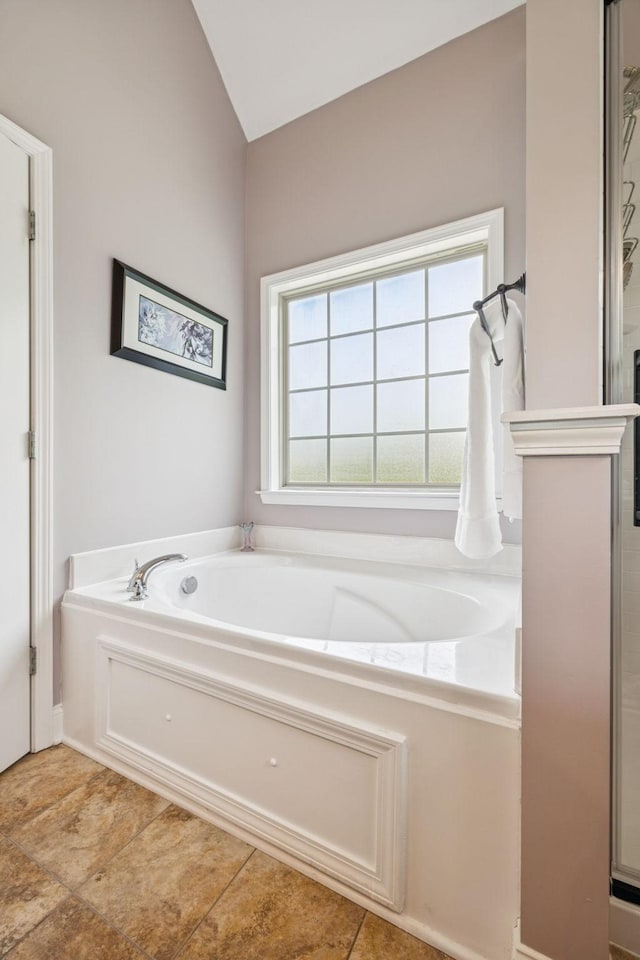 2090 Lequire Ln, Spring Hill, TN 37174 - bathroom with a garden tub, lofted ceiling, and tile patterned flooring
