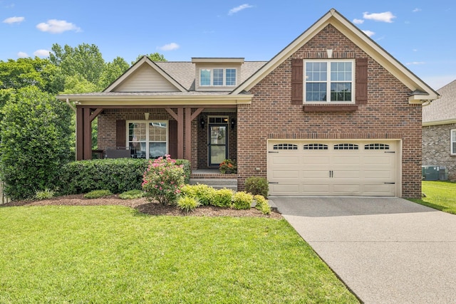 2090 Lequire Ln, Spring Hill, TN 37174 - view of front facade with central AC, brick siding, driveway, a front lawn, and an attached garage