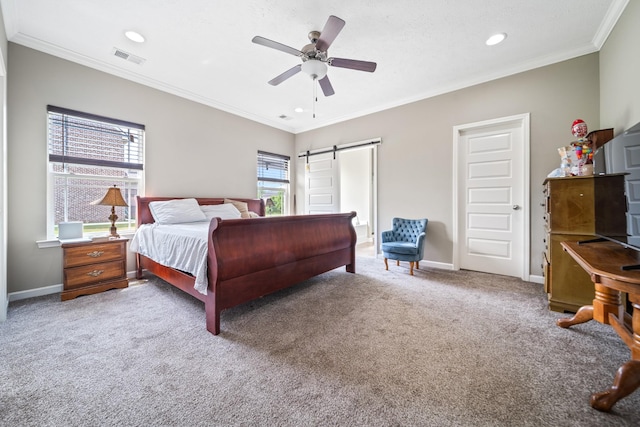 1426 Alamo Ave, Murfreesboro, TN 37129 - bedroom featuring carpet flooring, ornamental molding, a barn door, recessed lighting, and baseboards