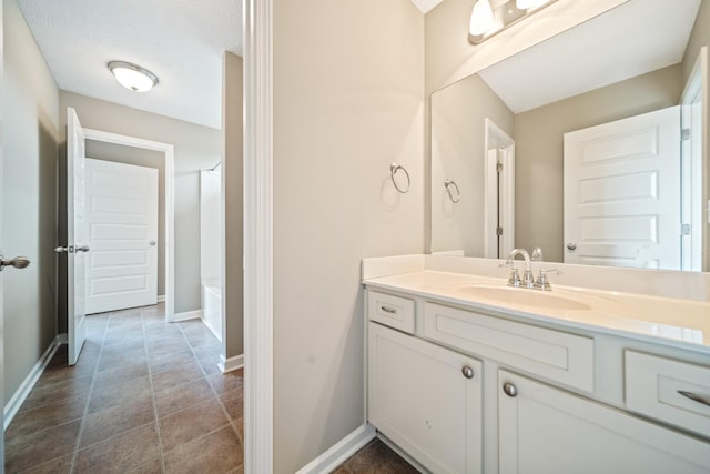 1426 Alamo Ave, Murfreesboro, TN 37129 - bathroom with vanity, baseboards, and shower / tub combination