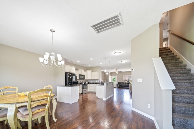 1426 Alamo Ave, Murfreesboro, TN 37129 - dining room with dark wood-type flooring, stairs, a chandelier, baseboards, and recessed lighting