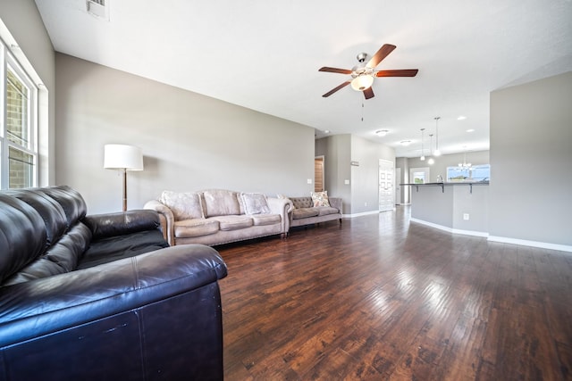 1426 Alamo Ave, Murfreesboro, TN 37129 - living room featuring dark wood finished floors, ceiling fan, and baseboards