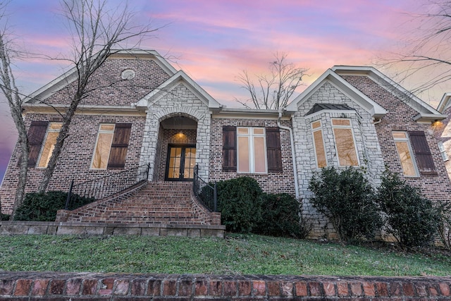 1107 Stonebridge Park Dr, Franklin, TN 37069 - french country home with brick siding and french doors