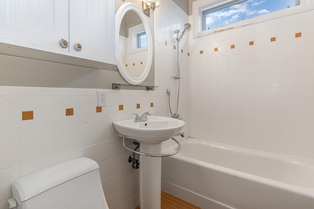 1107 Stonebridge Park Dr, Franklin, TN 37069 - full bathroom with toilet, shower / bath combination, and tile walls