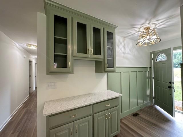 807 Poplar Dr, Centerville, TN 37033 - mudroom featuring dark wood finished floors and a wainscoted wall