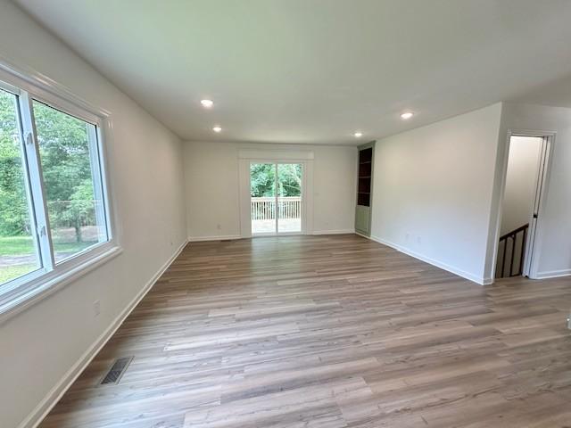 807 Poplar Dr, Centerville, TN 37033 - unfurnished room featuring plenty of natural light, baseboards, and recessed lighting