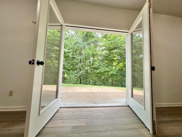 807 Poplar Dr, Centerville, TN 37033 - entryway featuring baseboards and wood finished floors